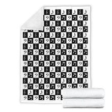 Load image into Gallery viewer, Black and White Checkered Music Note Pattern Fleece Throw Blanket With White Border