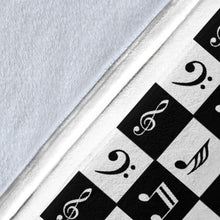 Load image into Gallery viewer, Black and White Checkered Music Note Pattern Fleece Throw Blanket With White Border