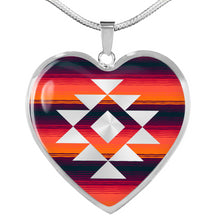 Load image into Gallery viewer, Heart Shaped Pendant With Tribal Design on Purple, Orange and Red Serape Background
