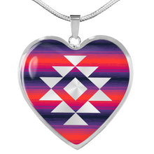 Load image into Gallery viewer, Heart Shaped Pendant With Tribal Element On Serape Inspired Pink and Purple Background
