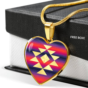 Heart Shaped Pendant With Tribal Element On Serape Inspired Pink and Purple Background