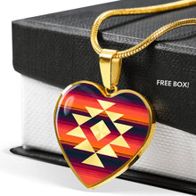 Load image into Gallery viewer, Heart Shaped Pendant With Tribal Design on Purple, Orange and Red Serape Background
