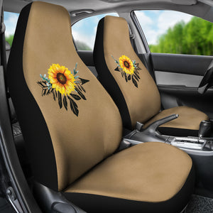 Sunflower dreamcatcher on light colored suede textured background