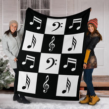 Load image into Gallery viewer, Black and White Large Checkered Music Notes Pattern Fleece Throw Blanket
